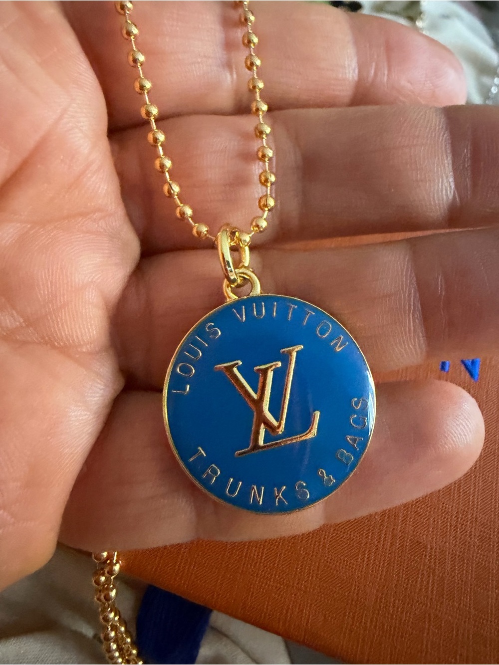 Unbranded 35 inch long Blue Enamel Round Pendant Necklace - Gold Tone
